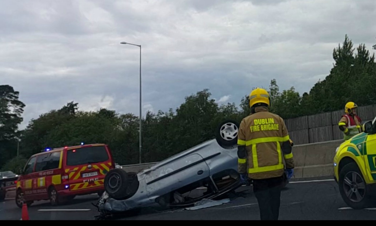 Delays on M50 easing as overturned vehicle is removed Delays on M50 easing as overturned vehicle is removed
