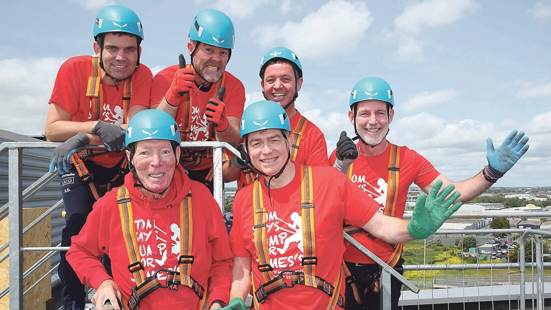 Tom abseils down Red Cow Moran Hotel