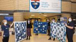 Nursing team presented with star themed thank you quilts