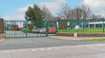 Thugs throw concrete slabs at school windows