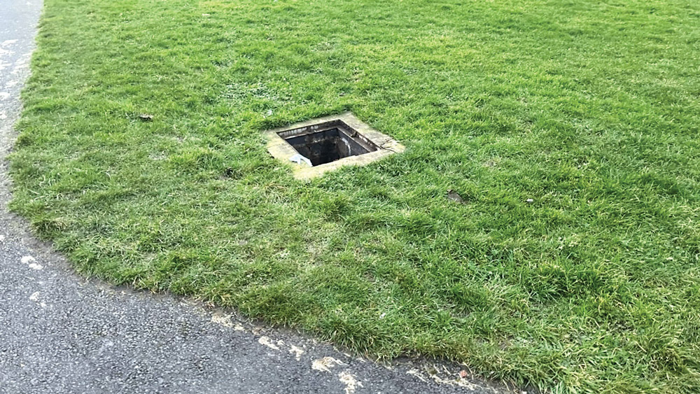 Mystery surrounds removal of four metal lids in estate Mystery surrounds removal of four metal lids in estate