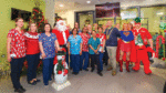 Patient Lily (8) turns on hospital christmas lights
