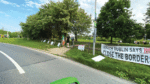 Hoarding set on fire at former SIAC site which houses male migrants