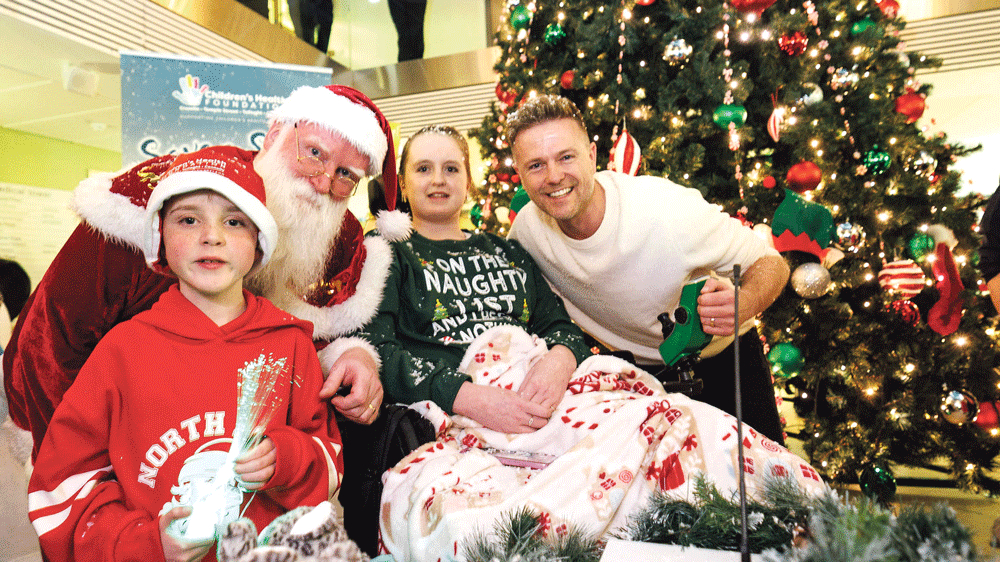 Harry helps turn on Christmas lights at Children’s Hospital