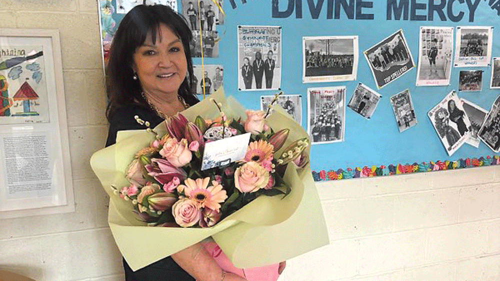 Principal retires after 40 years in Divine Mercy