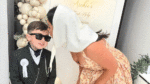 Archie heads back to America after making First Communion