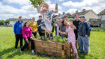 Community come together to build nine new planters