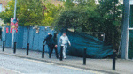 Hoarding at villlage described as dangerous and unsightly
